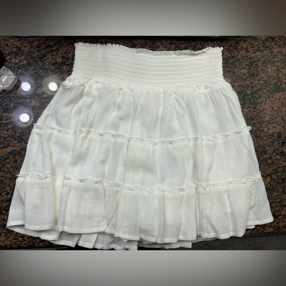 Pink Lily skirt with shorts under.  Never worn